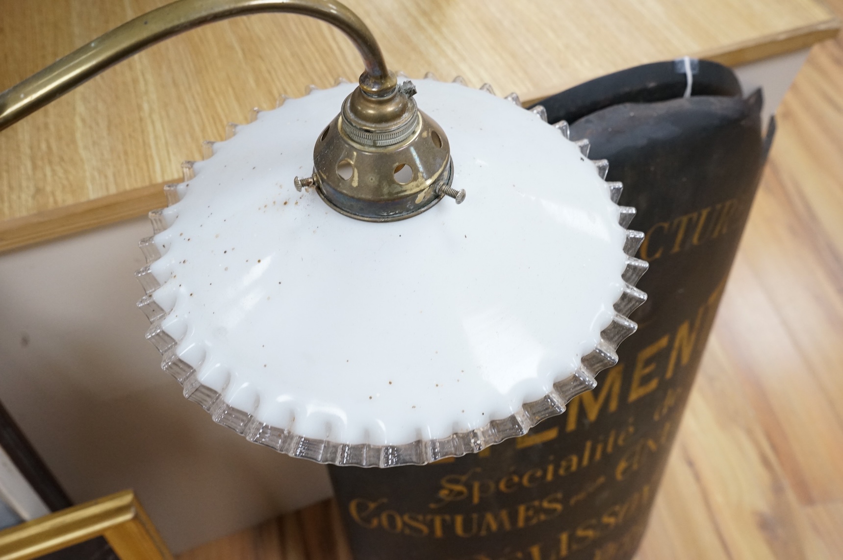 A 19th century brass two branch adjustable ceiling light, with with white glass shades, 82cm full width shade to shade